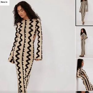 Bold Black and Cream Sheath Dress for Night Out with Long Sleeves